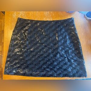 Sequined black mini skirt